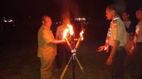 Pawai Obor Sertai Peringatan HUT Pramuka ke 58 di Kecamatan Muara Bengkal